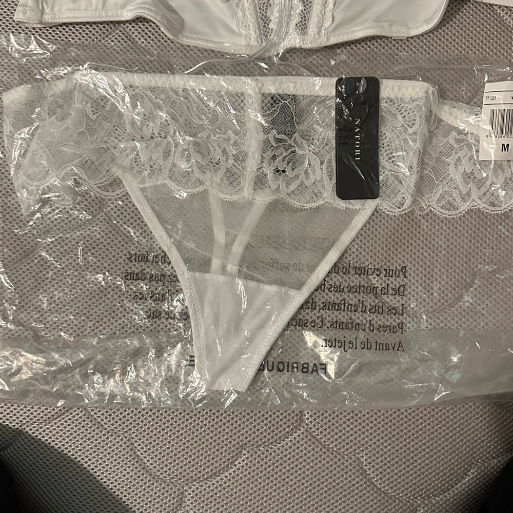 Brand new, never even taken out of the package, Natori white thong